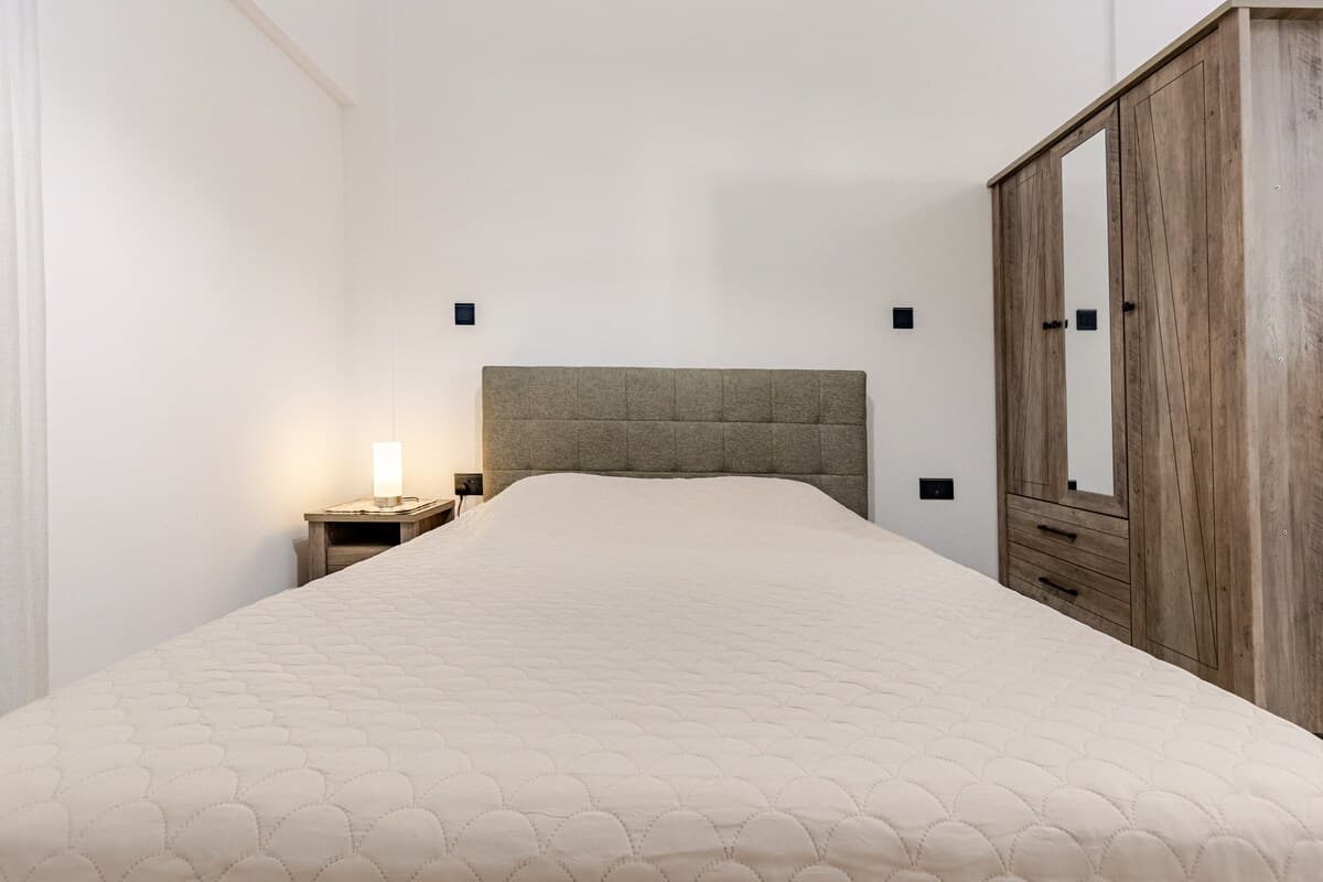 Διπλό κρεβάτι στο Niki Breeze Elite Beach Suite